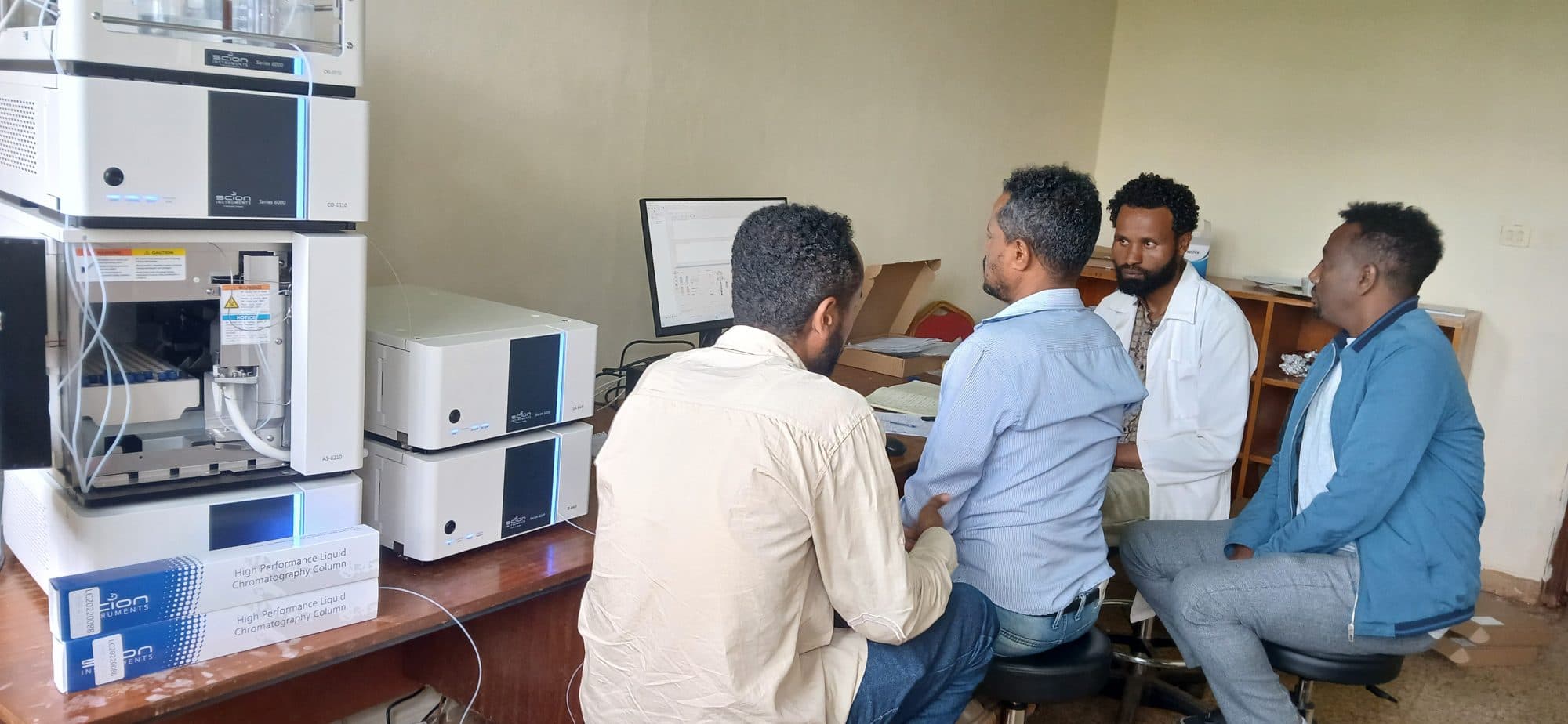 Ethiolab engineer training the Jimma laboratory team at the newly installed HPLC system